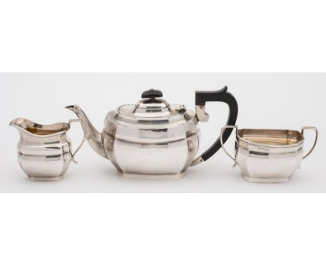 A George V silver three-piece tea service, maker J B Chatterley and Sons,  Birmingham, 1919/20: of barge-shaped outline, with