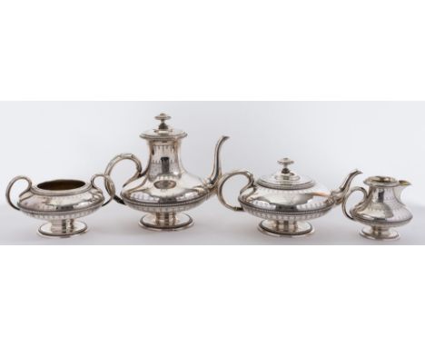 A Victorian silver four-piece tea and coffee service, maker Elkington & Co Ltd, Birmingham, 1866: monogrammed, of circular fo