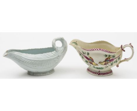 A Worcester cos lettuce sauceboat and a polychrome sauceboat: the first in the white, circa 1760,18 cm wide [minor chips]; th