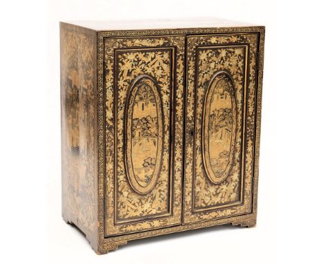 A 19th century Cantonese export lacquer table top cabinet: of rectangular outline, the top and sides decorated all over with 