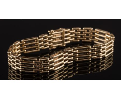 A 9ct gold four-bar gate-link bracelet:, approximately 22cm total length, 44gms gross weight. 