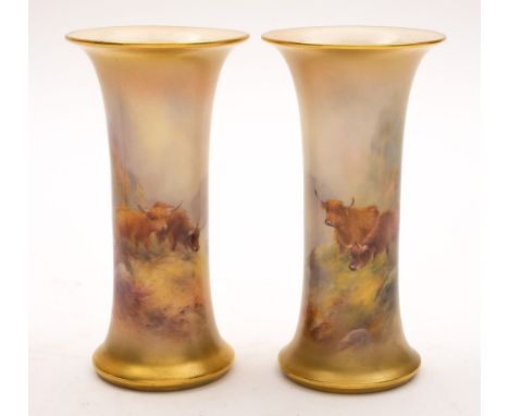 A pair of Royal Worcester vases painted by Harry Stinton: of trumpet form, painted with Highland cattle in rocky moorland lan