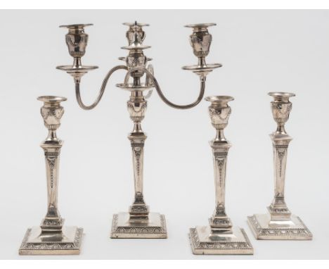 A set of four Victorian silver candlesticks, maker James Kebberling Bembridge, Sheffield 1880: of neo-classical design, with 