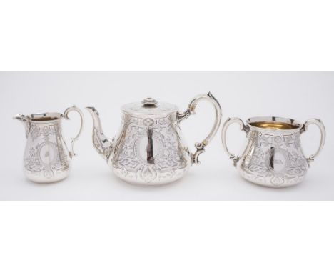 A Victorian silver presentation three-piece tea service, maker Robert Harper, London, 1862: monogrammed and inscribed to the 