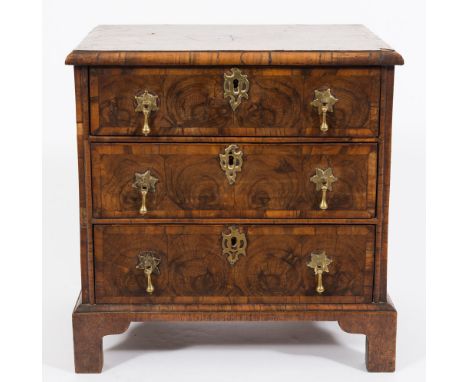 An apprenticeman's 18th Century walnut oyster veneer chest:, crossbanded and inlaid with sycamore lines, the quarter veneered