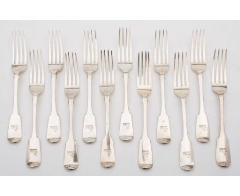 A set of eleven  Victorian silver Fiddle pattern table forks, maker George Adams, London, 1842: crested, together with a near