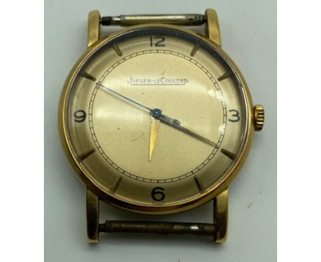 A GENTS 1950S 18CT GOLD JAEGER-LECOULTRE WRISTWATCH.CAL 475.NOT WORKING.EXPERT EXAMINATION SHOWS THE PINION ON WHICH THE LOOS