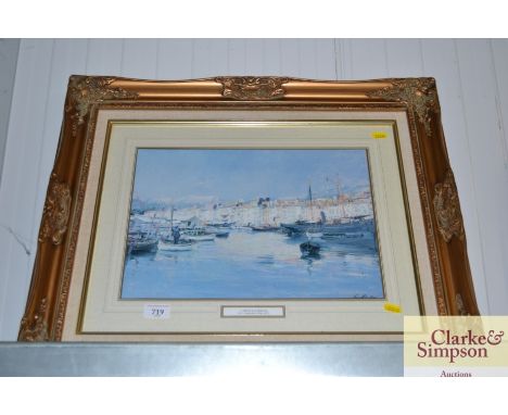 A gilt framed print of a French harbour 