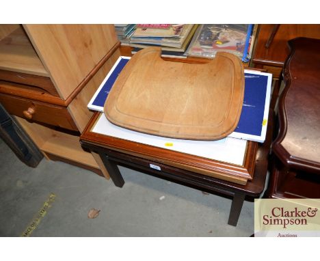 A quantity of pictures and prints; a chopping board; and a side table