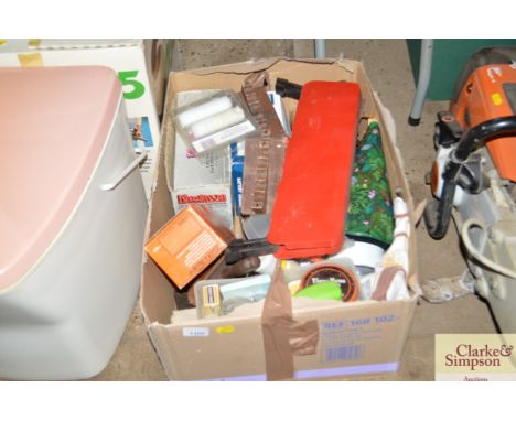 A box containing paint brushes; various tools etc