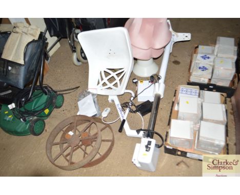 An electric bath hoist with manual 