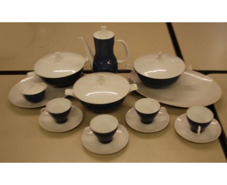 A MODERN THOMAS OF GERMANY PART DINNER AND TEA SERVICE DECORATED IN MATTE BLUE AND WHITE. THE SET CONSISTS OF 4 CUPS AND SAUC