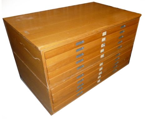 MODERN LIGHT OAK AND BEECHWOOD TWO PART PLANS CHEST OF TEN FULL WIDTH DRAWERS, WITH CUT OUT RECESSED HANDLES AND STANDING ON 