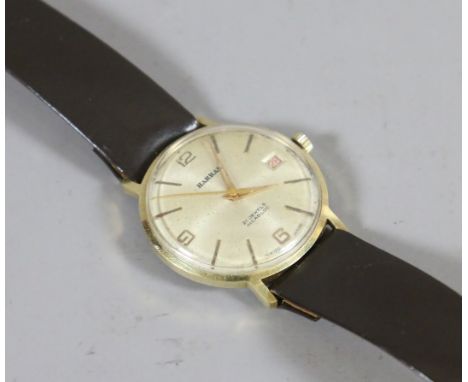 A Harral stainless steel and gold capped manual wristwatch on leather strap with satin dial, baton and numeral markers, centr