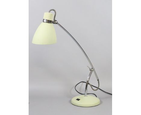 An adjustable chrome and painted metal reading lamp.