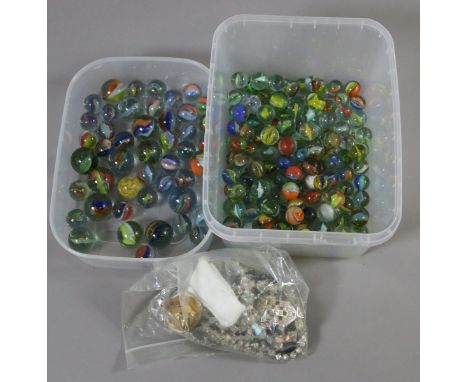 A collection of vintage polychrome glass marbles along with some costume jewellery.