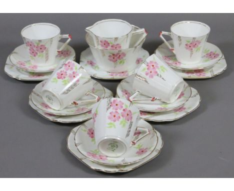 An Art Deco tea service decorated with flowers by Stanley China, England (eighteen pieces).