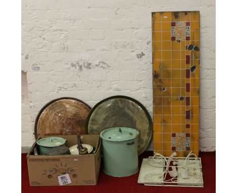 A collection of metalware to include enamel bread bins and a jam pan along with a folding shelf and two brass chargers.