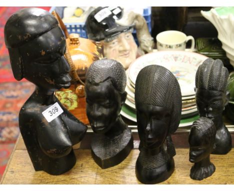 A collection of carved African art.