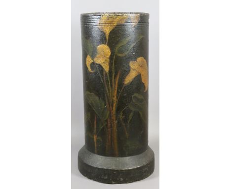 A folk art painted terracotta chimney pot/stick stand decorated with lilies. 