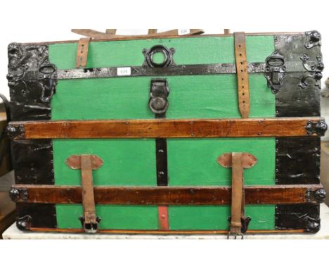 A bound and painted fitted travelling trunk.