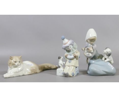 A Lladro figure of a clown and a women holding a cat and a dog along with a Nao figure of a cat.