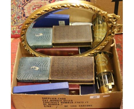 A collection of metalwares to include cased flatwares, brass miners lamp, gilt framed wall mirror etc.