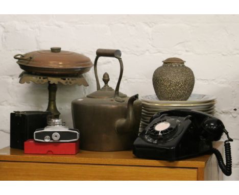 A collection of metalwares and ceramics to include copper kettle, cabinet plates, vintage dial telephone, camera, etc.