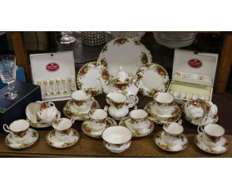 A Royal Albert tea service decorated in the Old Country Rose pattern approximately thirty six pieces to include cased dessert