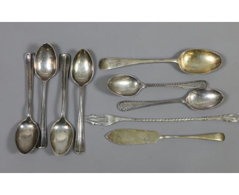 Seven silver teaspoons, a silver butter knife and a silver pickle fork 111.14 grams.