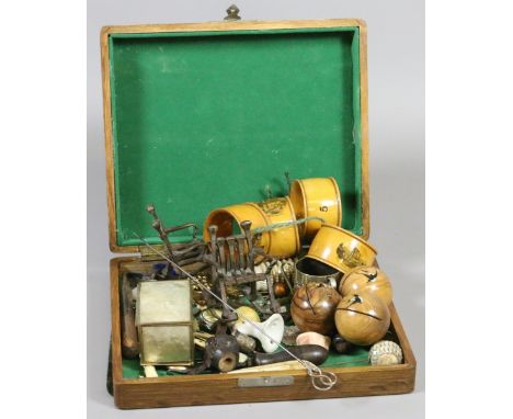 A box of collectables including Mauchline ware serviette rings, vintage wristwatch, hatpins, silver thimble and Black Forest 