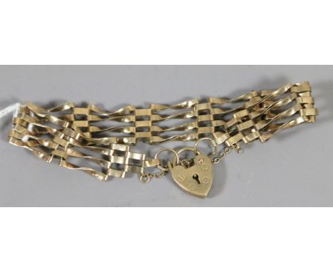 A ladies 9ct gold gate bracelet with heart shaped clasp, 7.44 grams.