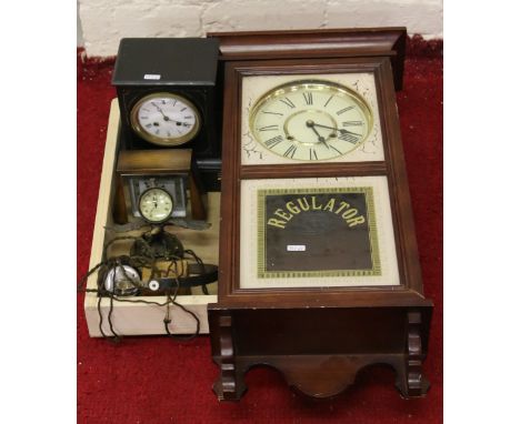 A collection of time pieces to include a regulator wall clock, slate mantel, two alarms and a brass model of an eagle clock.
