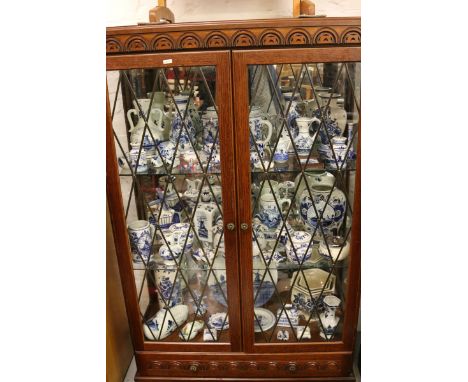 A collection of tourist delftware to include vases, figures, ornaments, etc.