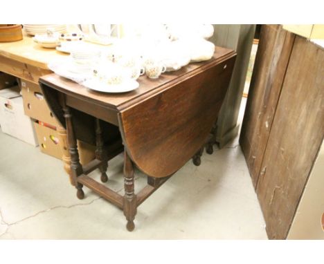 Oak Oval Gate-leg Table on Turned Legs