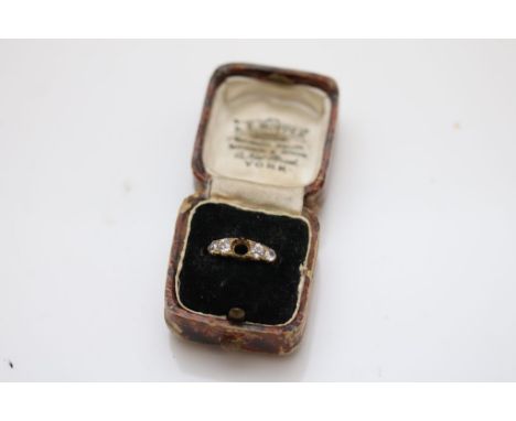 A Victorian diamond boat head 18ct yellow gold ring, central diamond deficient, four graduated round old cut diamonds, total 