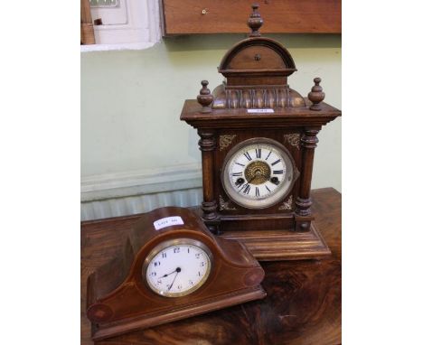 An early 20th century probably German architectural soft wood mantel clock plus one other. An Edwardian mahogany mantel timep