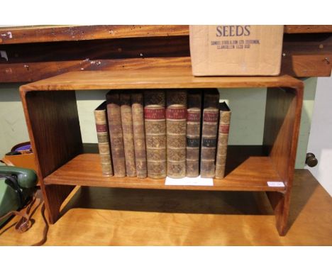 A retro design coffee table with book shelf under tier.