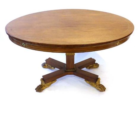 A 19th century rosewood and brass inlaid centre table, the oval surface on a square straight column, platform base and gilt c