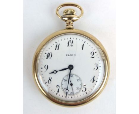 An early 20th century gold plated open face pocket watch by Elgin, the white enamel dial with black Arabic numerals and secon