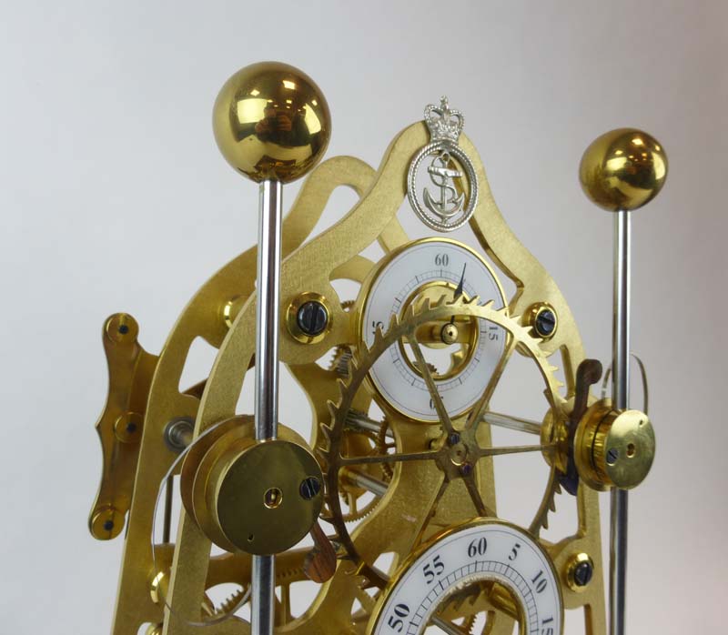 A skeleton clock by The Greenwich Clock Co. of London