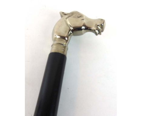 A 20th century walking stick, the pommel moulded as a chromed horse's head