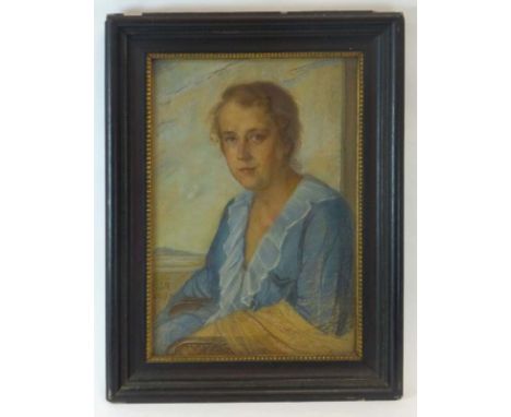Attributed to Trudy McGuinness (early 20th century),a portrait of a seated lady in a blue dress,unsigned,pastels,60 x 40 cm,t