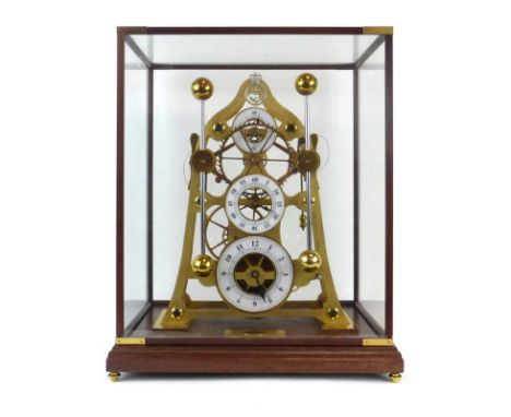 A 'Grasshopper' skeleton clock by The Greenwich Clock Co. of London with three enamelled dials, fusee movement, grasshopper e