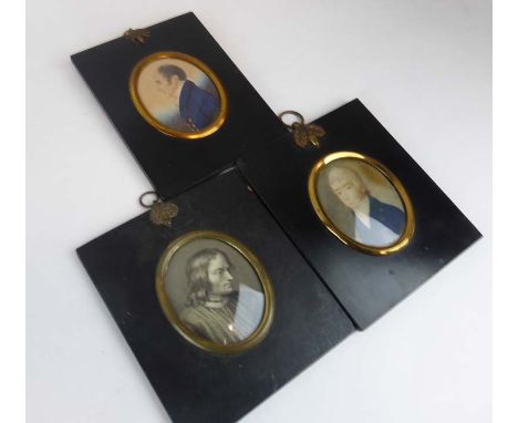 A late 18th century miniature watercolour head and shoulders portrait of a man in a blue jacket, within an ebonised and gilt 