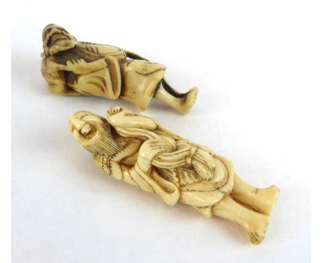 A Meiji carved ivory netsuke modelled as a laughing gentleman, h. 6 cm, together with a further netsuke (2) CONDITION REPORT: