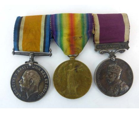 A set of three First World War medals awarded to 14095 Gnr. A.F. McDowell., R.A., including a Victory Medal, a Defence Medal 