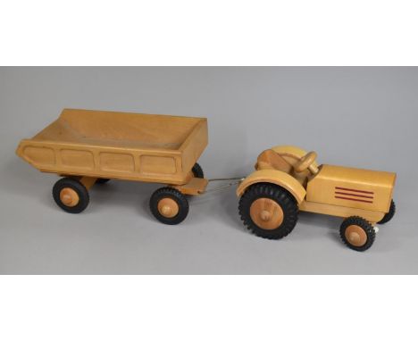 A Modern East German Wooden Toy Tractor and Trailer Set 