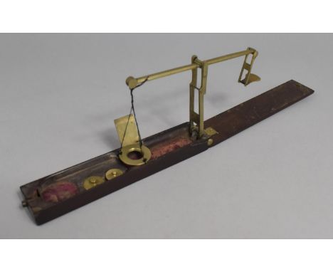 An 18th Century Rosewood Cased Brass Folding Guinea Scale  by Calingwood Ward C.1790 