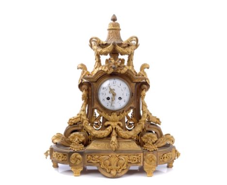 Late 19th century French mantel clock with eight day movement, outside countwheel, striking on a bell, white enamel dial with